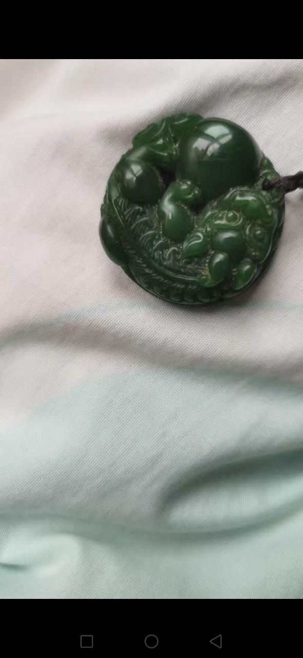圆形佩饰类玉质雕件
